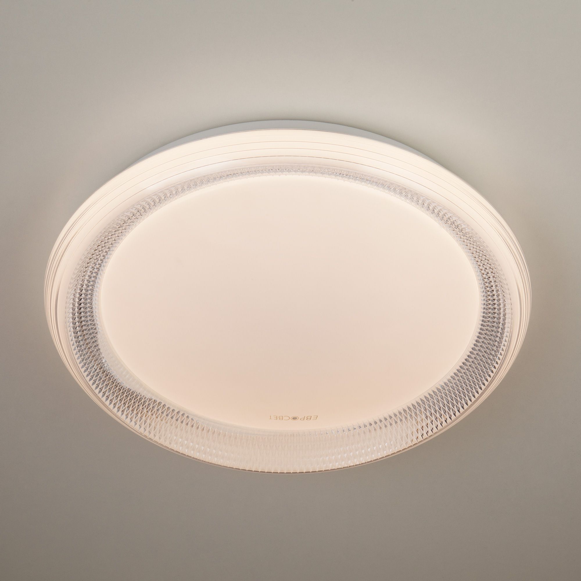 Светодиодный настенно-потолочный светильник с пультом Eurosvet Weave 40012/1 LED белый. Фото 1